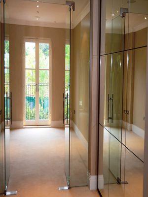 Glass Balustrades and Architectural Glass by Hamilton Glass Products Ltd - an image showing glass supplied and installed for a hallway partition and door