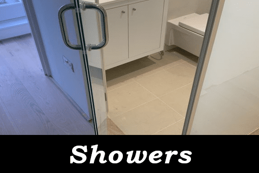 An image of a glass enclosure for a shower by Hamilton Glass Products Ltd which can be clicked to visit the Shower's section of the website.