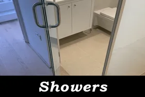 An image of a  glass shower enclosure, produced and installed by Hamilton Glass Products Ltd which can be used to navigate to the shower glass page 