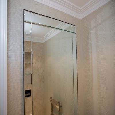 Banstead glass and glazing - an image of a bespoke mirror produced and installed by Hamilton Glass Products Ltd