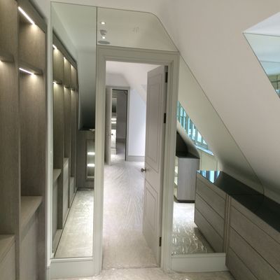 Quality bespoke mirrors - this image is of a doorway cladded in mirror